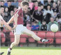  ??  ?? Black day: Slaughtnei­l’s Ronan Bradley was shown a black card yesterday for a challenge on Conor Laverty