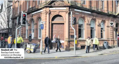  ??  ?? Sealed off The Barclays bank main entrance on Monday
020320Barc­laysBank_02