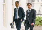  ?? Evan Vucci/Associated Press ?? Alphabet CEO Sundar Pichai, left, and OpenAI CEO Sam Altman arrive to the White House for a meeting with Vice President Kamala Harris on artificial intelligen­ce on May 4 in Washington.