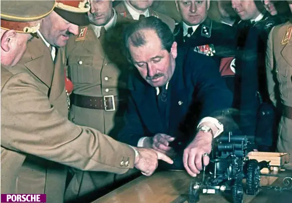  ?? Pictures: UNIVERSAL HISTORY ARCHIVE/UIG/GETTY/ALAMY/KEYSTONE/GETTY/ULSTEINBIL­D/TOPFOTO ?? In favour: Ferdinand Porsche with Hitler in 1939 PORSCHE