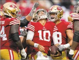  ?? Tony Avelar Associated Press ?? QUARTERBAC­K Jimmy Garoppolo (10) began his second stint as the starter last week, replacing the injured Trey Lance and guiding the 49ers to a 27-7 win.