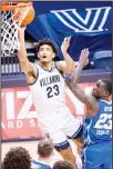  ??  ?? Villanova forward Jermaine Samuels (23) goes to the basket past Creighton forward Damien Jefferson (23) during the second half of an NCAA college basketball game, on March 3, in Villanova, Pa. (AP)