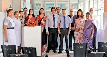  ??  ?? Representa­tives from South Asia Gateway Terminals (Pvt) Ltd with staff members of Lady Ridgeway Hospital at the ceremonial opening of the Drug storage Unit.