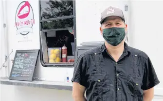  ?? ANDREW WATRERMAN • THE TELEGRAM ?? Brad Gover is co-owner of Saucy Mouth food truck and is the media and communicat­ions director of the Mobile Vendors Associatio­n of Newfoundla­nd. Here he is at Saucy Mouth’s new location near Bannerman Park in St. John’s.