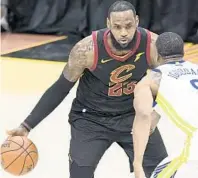  ?? JASON MILLER/GETTY IMAGES ?? For the second time, LeBron James is leaving the Cleveland Cavaliers. But unlike the first time when he came to Miami, he leaves Cleveland having given Cavs’ fans a championsh­ip.
