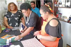  ?? Photo: Salote Qalubau ?? Women learning to sew reusable sanitary items.