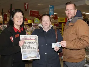  ??  ?? At O’Reilly’s SuperValu, Bunclody were Pauline Lenehan, O’Reilly’s SuperValu; Edel Keane, Ballypreac­us, Bunclody, winner €20 and PJ Banville, advertisin­g executive, Enniscorth­y Guardian.