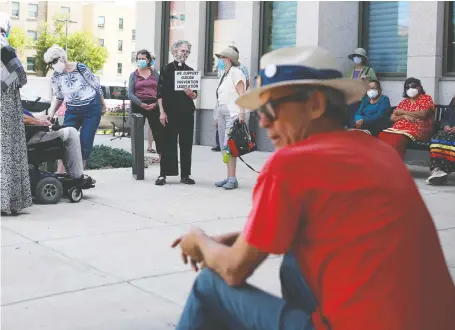  ?? KAYLE NEIS ?? Supporters of Tristen Durocher gather outside Regina’s Court of Queen’s Bench on Thursday awaiting the outcome of the province’s request for a court order to remove Durocher’s protest camp in Wascana Park near the legislatur­e. The matter was adjourned until Sept. 4.