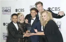  ?? — AFP ?? The cast of “Baby Daddy” pose in the press room during the People’s Choice Awards 2017.