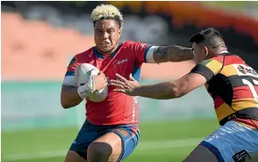  ?? PHOTOSPORT ?? Tima Fainga’anuku takes on the Waikato defence while playing for Tasman this season.
