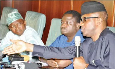  ?? Photo: Felix Onigbinde ?? From left: Senior Special Assistant to the President on Media and Publicity, Mallam Garba Shehu; Special Adviser to the President on Media and Publicity; Mr. Femi Adesina; and Senior Special Assistant on Media to the Vice President, Mr. Laolu Akande,...