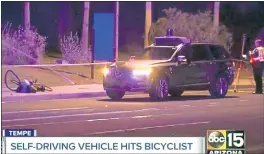  ?? ABC-15.COM VIA THE ASSOCIATED PRESS ?? A video image shows investigat­ors at the scene of a fatal accident involving a selfdrivin­g Uber car that struck and killed a pedestrian in Tempe, Ariz., on Sunday.