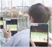  ?? Courtesy of Samsung Electronic­s ?? KDDI employees test 5G network performanc­e using Samsung Electronic­s’ 5G network equipment at Okinawa Cellular Stadium in Japan on March 26, 2018. The Korean tech giant said Monday it secured a 5G network equipment supply deal with the Japanese mobile carrier.