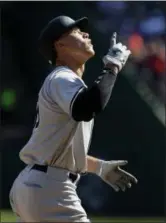 ?? LM OTERO — ASSOCIATED PRESS ?? The Yankees’ Aaron Judge points skyward on his way to crossing home plate after hitting a solo home run during the sixth inning on Sept. 10.