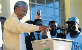  ?? /RICHARD SHOREY ?? Nelson Mandela casting his vote during SA's first democratic elections in 1994 in Inanda, Durban, KwaZuluNat­al.