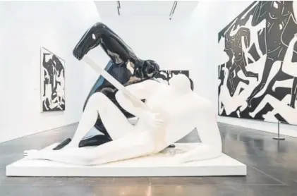  ??  ?? Top, Cleon Peterson’s “The Crawler,” 2017, acrylic on canvas. Provided by the MCA Denver Above, Peterson’s “The Embrace” is on display at MCA Denver. From the Hip Photo, Provided by MCA Denver