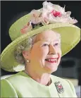  ??  ?? The Queen smiles as she is greeted by astronauts aboard the Internatio­nal Space Station, via video conference, during her visit to NASA’s Goddard Flight Center in Greenbelt, Md., May 8, 2007.