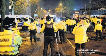  ??  ?? CRACKDOWN: Police out in force after the game.