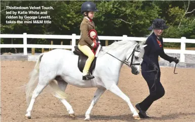  ??  ?? Thistledow­n Velvet Touch, led by Katie White and ridden by George Levett, takes the mini M&amp;M title