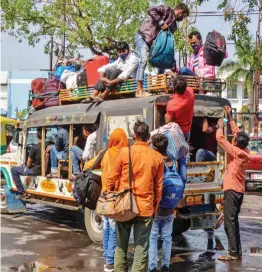  ?? — PTI ?? Migrants arrive in Ranchi from Mumbai as they leave for their native places in Jharkhand amid rise in Covid-19 cases across the country on Thursday.