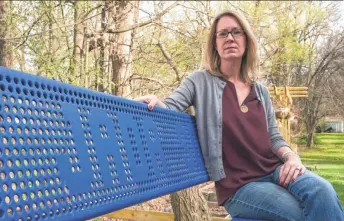  ?? PHOTOS BY EILEEN BLASS, USA TODAY ?? Zoey Mendoza Zimmerman, 42, sits in her Warwick, N.Y., backyard on a bench that bears the name of her daughter, Jada, 5. Another bench includes the name of her son, Jordan, 3.