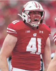  ?? JEFF HANISCH/USA TODAY SPORTS ?? Wisconsin linebacker Noah Burks (41) celebrates after forcing a turnover against Iowa at Camp Randall Stadium.