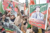  ?? AFP PHOTO ?? FREE OUR LEADER
Supporters of the Pakistan Tehreek-e-Insaf party shout slogans during a protest demanding the release of their leader and former prime minister Imran Khan, in the city of Peshawar, northweste­rn Pakistan, on Sunday, Jan. 28, 2024.