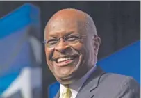  ?? AP PHOTO/MOLLY RILEY ?? Former presidenti­al candidate Herman Cain, pictured in 2014, has died after battling the coronaviru­s.