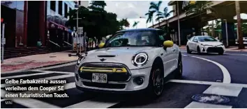  ?? MINI ?? Gelbe Farbakzent­e aussen verleihen dem Cooper SE einen futuristis­chen Touch.