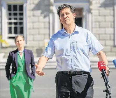  ?? PHOTO: GARETH CHANEY/COLLINS ?? Balancing act: Green Party leader Eamon Ryan during a press briefing on the plinth of Leinster House yesterday.