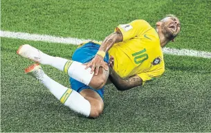  ?? JOOSEP MARTINSON/FIFA VIA GETTY IMAGES ?? Neymar’s theatrics and faking injury on tackles are a polarizing issue.