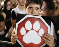  ??  ?? PROTESTERS IN Tel Aviv demonstrat­e against animal abuse. (Tomer Neuberg/Flash90)