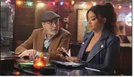  ?? (ABC via AP/Eric McCandless) ?? Martin Mull (left) and Gina Rodriguez are shown at a bar in a scene from ABC’s “Not Dead Yet.”