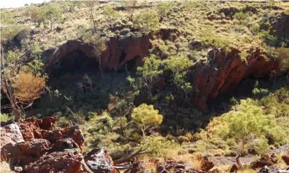  ?? Photograph: The Puutu Kunti Kurrama and Pinikura Aboriginal Corporatio­n. ?? This cave in the Juukan Gorge, dubbed Juukan 2, was destroyed in a mining blast by Rio Tinto.