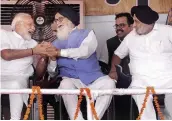  ?? — PTI ?? Prime Minister Narendra Modi with former Punjab chief minister Parkash Singh Badal and SAD president Sukhbir Singh Badal during the Kisan Kalyan Rally in Malout, Punjab, on Wednesday.