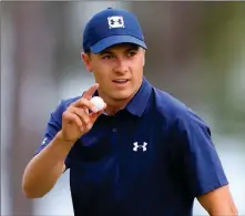  ?? ASSOCIATED PRESS ?? JORDAN SPIETH WAVES AFTER MAKING a birdie putt on the 16th hole during the first round at the Masters golf tournament Thursday in Augusta, Ga.