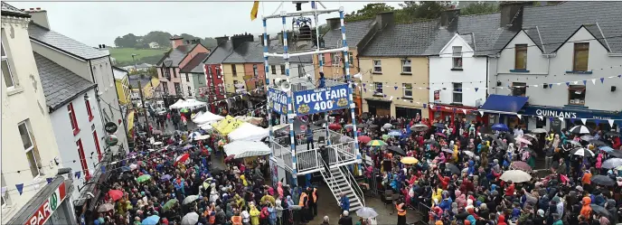  ??  ?? Scenes from last year’s Puck Fair, when thousands gathered to mark the crowning of the Puck Goat in Killorglin. This year’s Fair has been cancelled due to the COVID-19 pandemic.