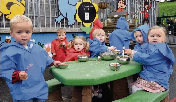  ??  ?? Children enjoy the outdoors area at Cylch Meithrin Cynwyd Sant