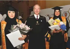  ?? Ahmed Kutty/Gulf News ?? James Anthony Morse with Aisha Al Beloushi and Sana Abdullah Salem, the first two women graduates from the Rabdan Academy in Abu Dhabi, after their graduation ceremony yesterday.