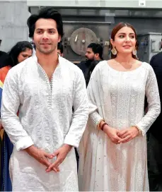  ??  ?? Varun Dhawan and Anushka Sharma at a promotiona­l event