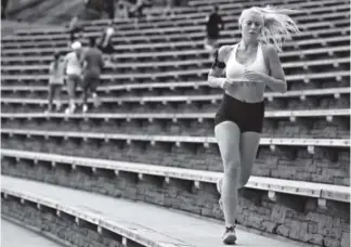  ??  ?? Madison Teter, 20, of Arvada runs at Red Rocks Amphitheat­re.