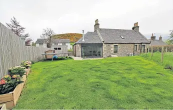  ??  ?? Tulach Dorcha underwent extensive refurbishm­ent and, although the outside maintains its original stonework, the inside is full of modern touches and luxury fittings. The rural location overlooks the popular walking spot of Darklaw Hill, after which the house was renamed.