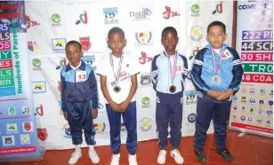  ?? ?? From left, Nenyasha Nhau from Marciskool Academy, Rejoice Chitanha from Rose of Sharon, Kyle Katsande and Charles Sambo from Connect Kids Junior who won prizes at the recent computer science sports tournament