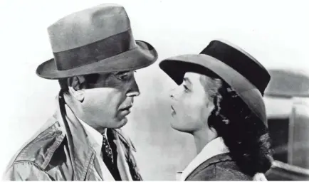  ?? TURNER ENTERTAINM­ENT ?? Humphrey Bogart and Ingrid Bergman play former lovers in a complicate­d situation in "Casablanca."