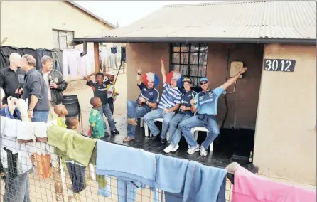  ??  ?? CELEBRATIN­G: Fans visit a shebeen in Soweto in 2010 during the Vodacom Super 14 final of the Blue Bulls vs Stormers.