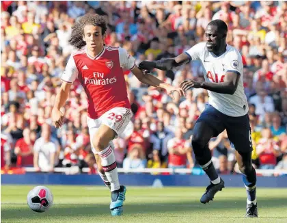  ?? Photo / AP ?? Matteo Guendouzi eludes Tottenham defender Davinson Sanchez during Arsenal’s draw yesterday.