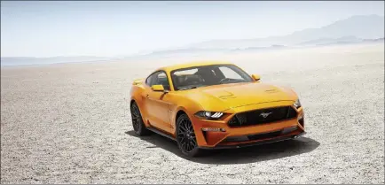  ?? COURTESY ?? As part of the plan, the Mustang will eventually be available in a hybrid version.