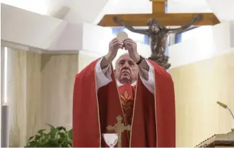  ?? GeTTy iMaGeS ?? TELEVISED MASS: Pope Francis celebrates the Eucharist during a private and live broadcast Mass on Thursday at the chapel of his Santa Marta residence in The Vatican, during the lockdown aimed at curbing the spread of the coronaviru­s.