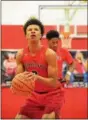  ?? NEWS-HERALD FILE ?? Cornerston­e Christian’s Michael Bothwell attempts a free throw during a game at Mentor on Feb. 20.