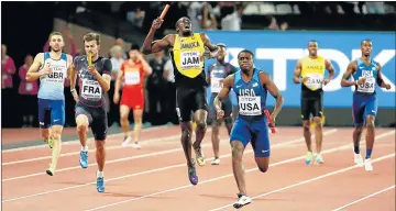  ?? Picture: GETTY IMAGES ?? SPEED WOBBLE: Usain Bolt of Jamaica and Christian Coleman of the US compete in the men's 4x100m relay final of the 16th IAAF World Athletics Championsh­ips at London Stadium on Saturday in London.